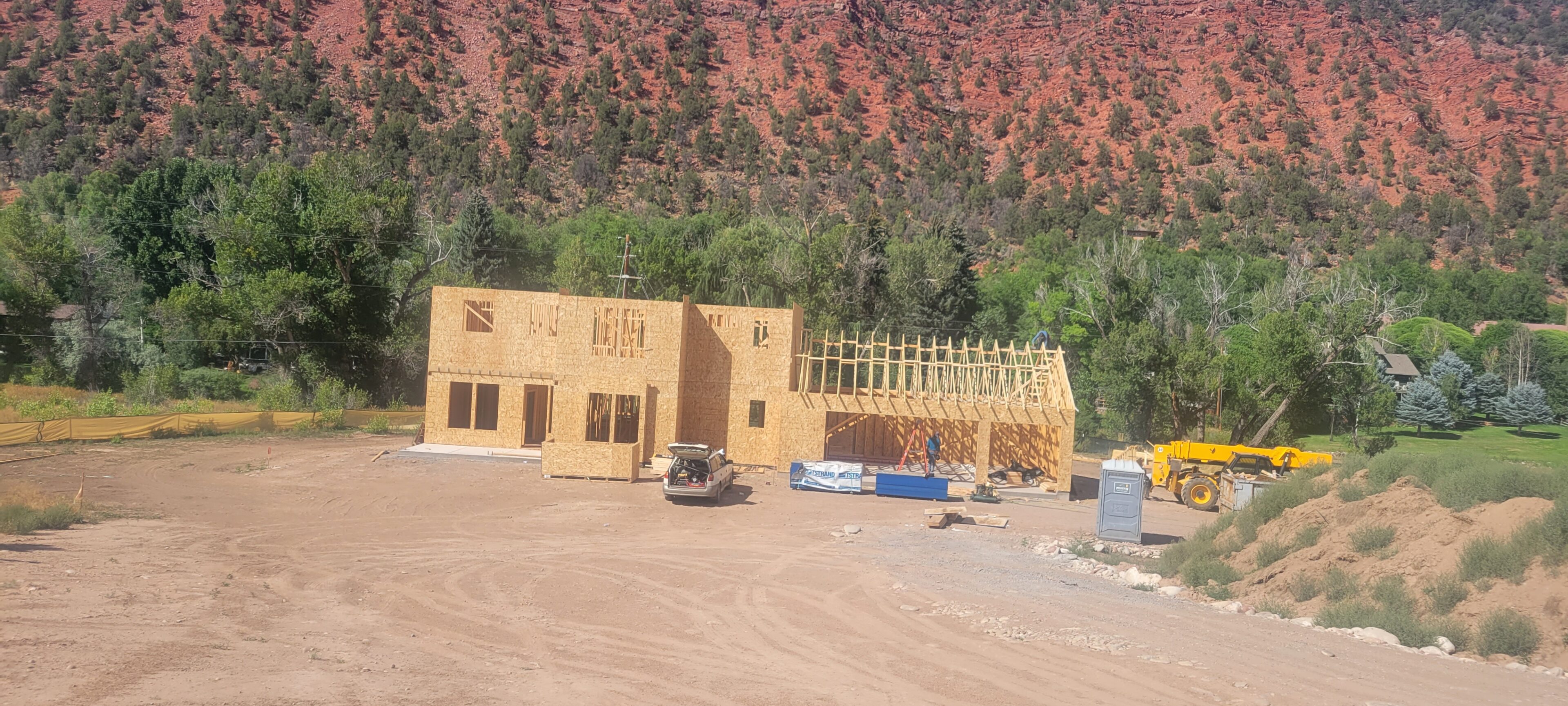 A building under construction in the desert.